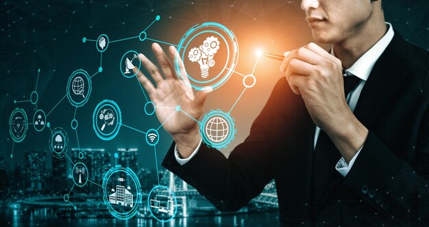 Businessman interacting with a futuristic digital interface showing tech icons and data over a modern city.